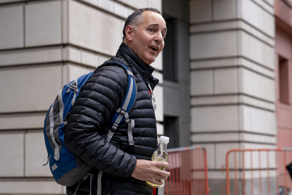 Joseph Hackett of Sarasota, Fla., speaks to reporters as he leaves federal court in Washington, Monday, Jan. 23, 2023, after he and three other members of the Oath Keepers have been convicted of seditious conspiracy in the Jan. 6, 2021 Capitol attack in the second major trial involving far-right extremists accused of plotting to forcibly keep President Donald Trump in power. (AP Photo/Andrew Harnik)