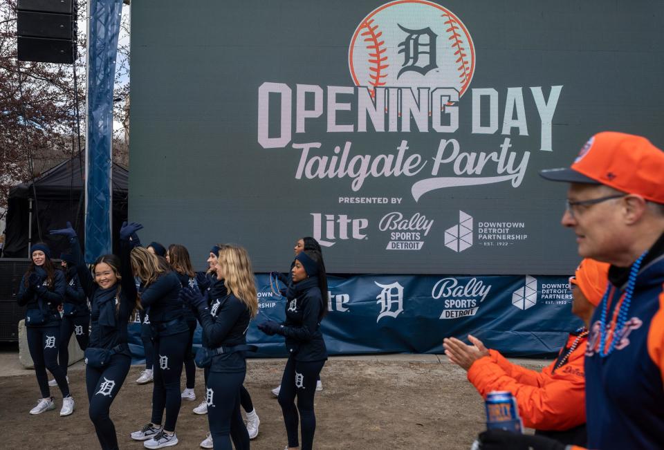 Members of the Detroit Tigers energy squad dance during the Tigers Opening Day tailgate party in Detroit on Friday, April 5, 2024.