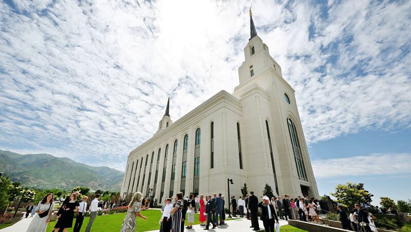 Members of the Church exit after the first dedicatory session after Elder David A. Bednar of the Quorum of the Twelve Apostles dedicates the Layton Utah Temple on Sunday, June 16, 2024.