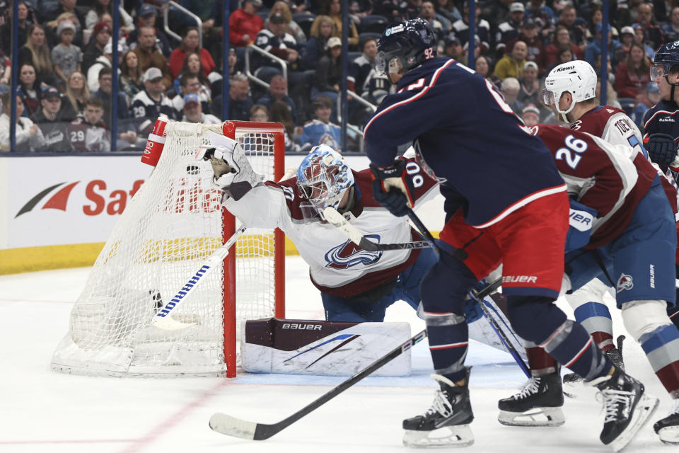 Columbus Blue Jackets forward Alexander Nylander scores his second goal of the period past Colorado Avalanche goalie Justus Annunen during the second period of an NHL hockey game in Columbus, Ohio, Monday, April 1, 2024. (AP Photo/Paul Vernon)