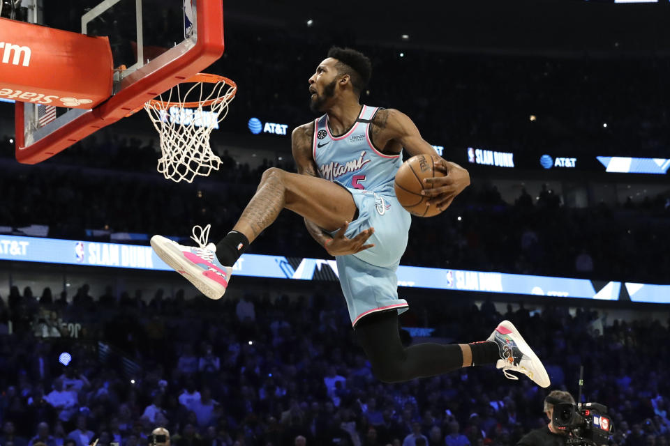 Derrick Jones Jr. picked up a trophy and a sneaker deal in Chicago.(AP Photo/Nam Y. Huh)