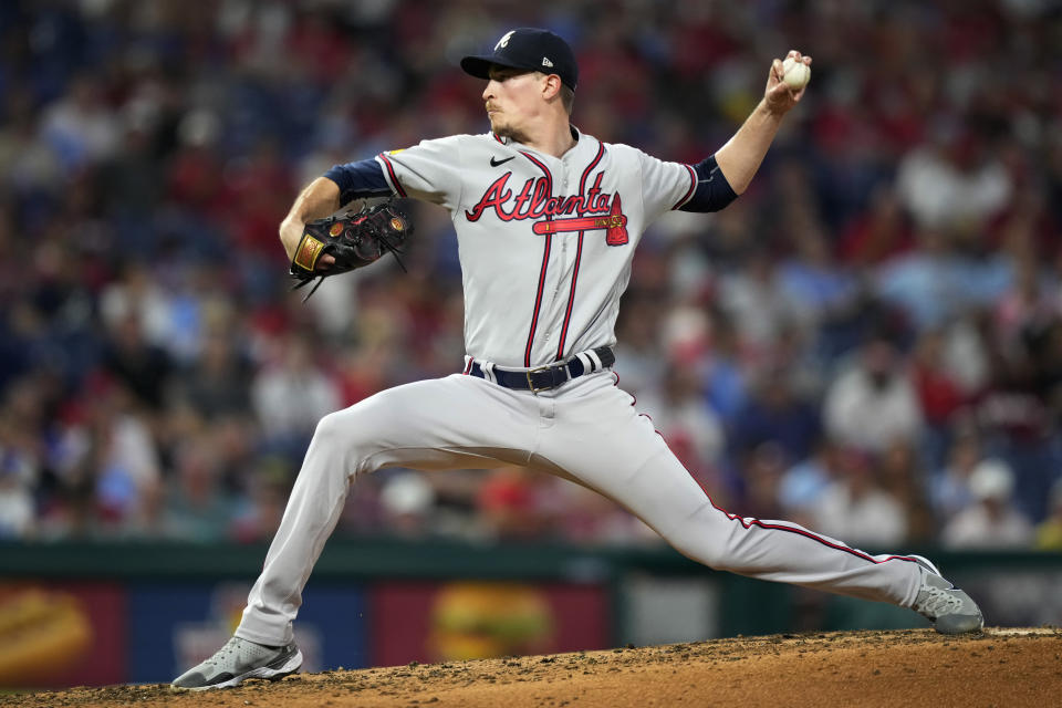 FILE - Atlanta Braves' Max Fried pitches during the third inning of a baseball game against the Philadelphia Phillies, Tuesday, Sept. 12, 2023, in Philadelphia. The Atlanta Braves have signed their last arbitration-eligible players by agreeing to deals with left-hander Max Fried and A.J. Minter. The Braves announced Thursday, Jan. 11, 2024, signing one-year deals with Fried for $15 million and Minter for $6.22 million.(AP Photo/Matt Slocum, File)