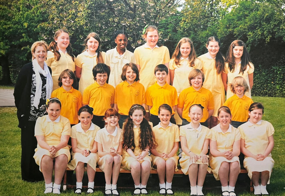 Turner was always much taller than her classmates, pictured in year 5 at primary school (Back row, 4th from the right). (Kathryn Turner/SWNS)