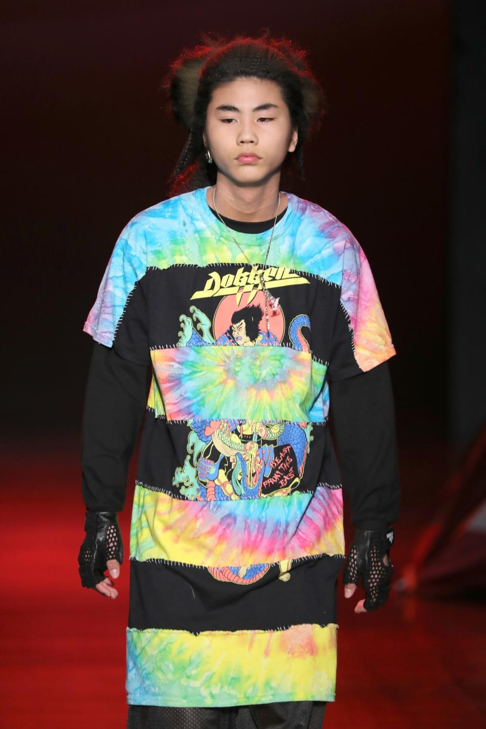 This Asian model wears a mix-mashed tie-dye and graphic oversize T-shirt.