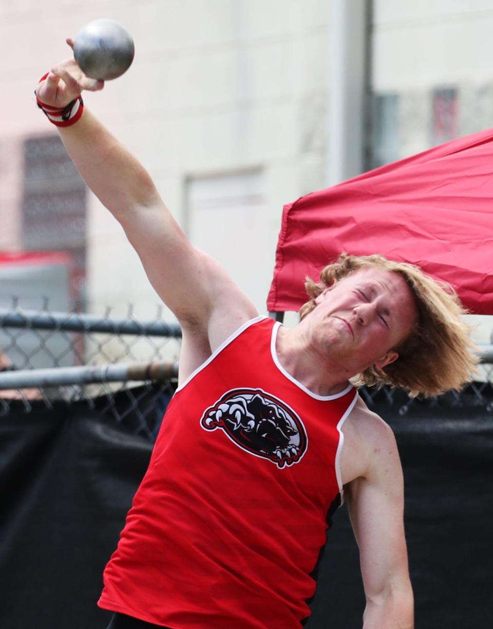 Manchester's Josiah Cox competes in the shot put in the Division II regional meet at Austintown Fitch High School on Saturday, May 28, 2022.