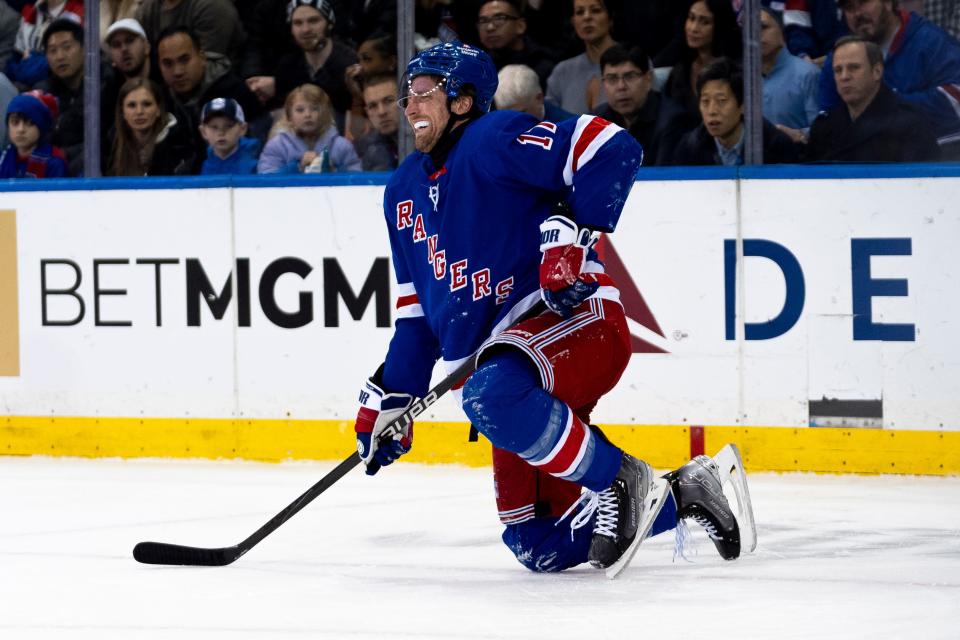 New York Rangers right wing Blake Wheeler (17) reacts while trying to stand in the first period of an NHL hockey game against the Montreal Canadiens, Thursday, Feb. 15, 2024, in New York.