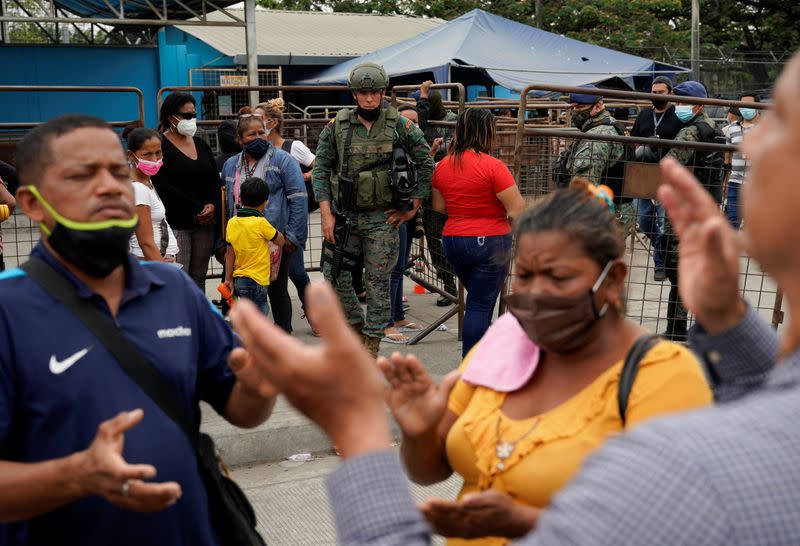 Soldiers stand guard following a deadly prison riot, in Guayaquil