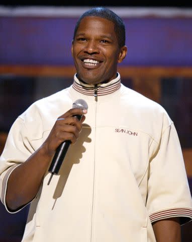 <p>Jesse Grant/WireImage</p> Jamie Foxx performing standup comedy in 2004