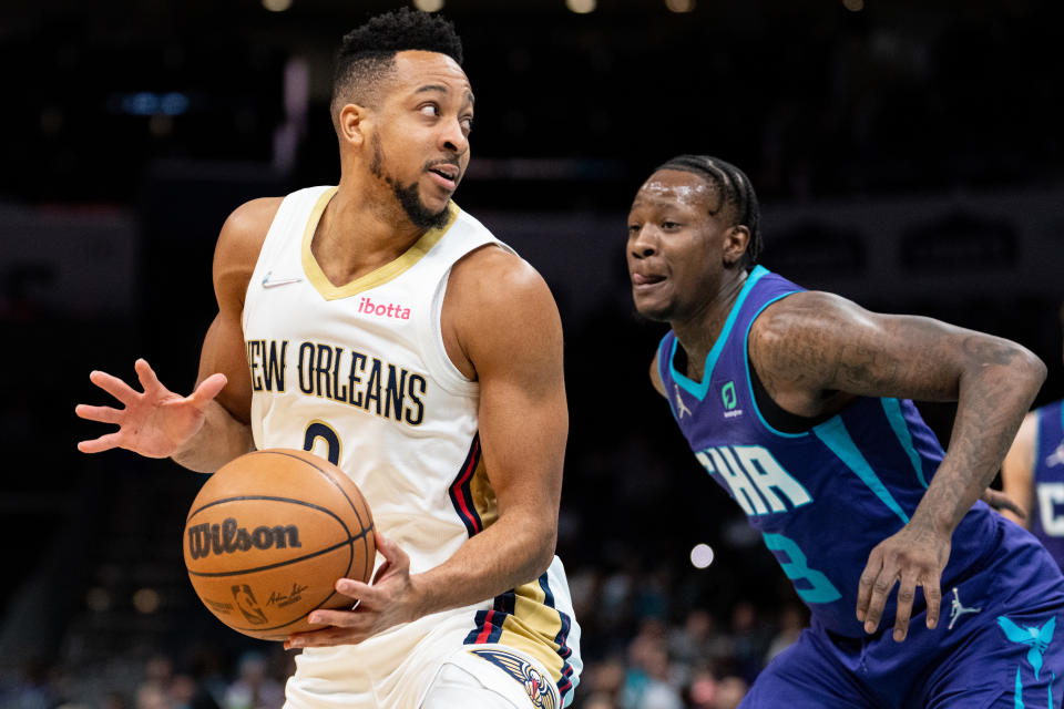 New Orleans guard CJ McCollum makes a move during a game against Charlotte on March 21. (Jacob Kupferman/Getty Images)