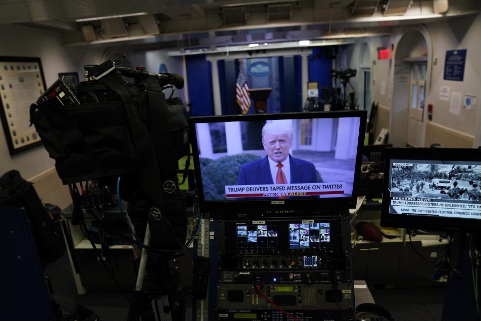 In a pre-recorded video message, President Donald Trump delivers a statement after rioters stormed the Capitol building during the electoral college certification of Joe Biden as President, Wednesday, Jan. 6, 2021, in Washington. (AP Photo/Evan Vucci)