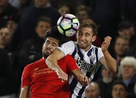 Britain Soccer Football - Liverpool v West Bromwich Albion - Premier League - Anfield - 22/10/16 Liverpool's Emre Can in action with West Bromwich Albion's Craig Dawson Reuters / Phil Noble Livepic