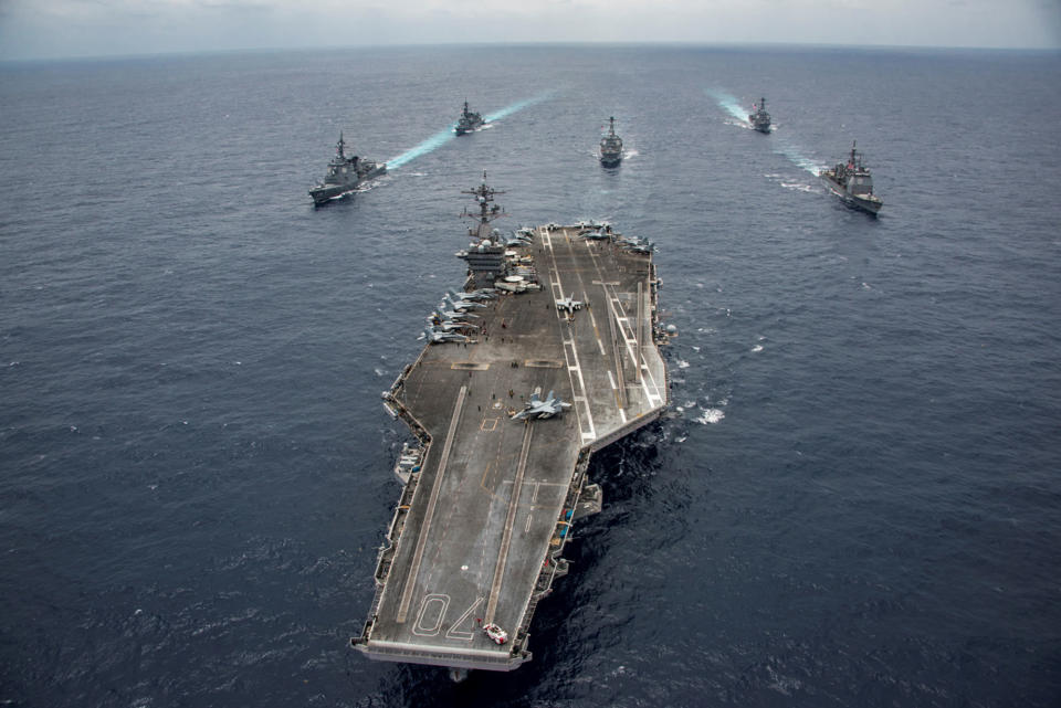 Japanese and U.S. Navy ships accompany USS Carl Vinson in the Philippine Sea