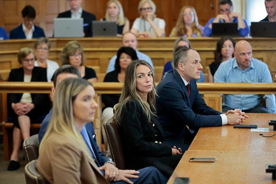 Karen Read listens as Judge Beverly J. Cannone greets the jury, at the start of the third day of deliberations in her murder trial, in Norfolk Superior Court on Thursday, June 27, 2024 in Dedham, Mass. Read is on trial, accused of killing her boyfriend Boston police Officer John O'Keefe, in 2022. (Pat Greenhouse/The Boston Globe via AP, Pool)