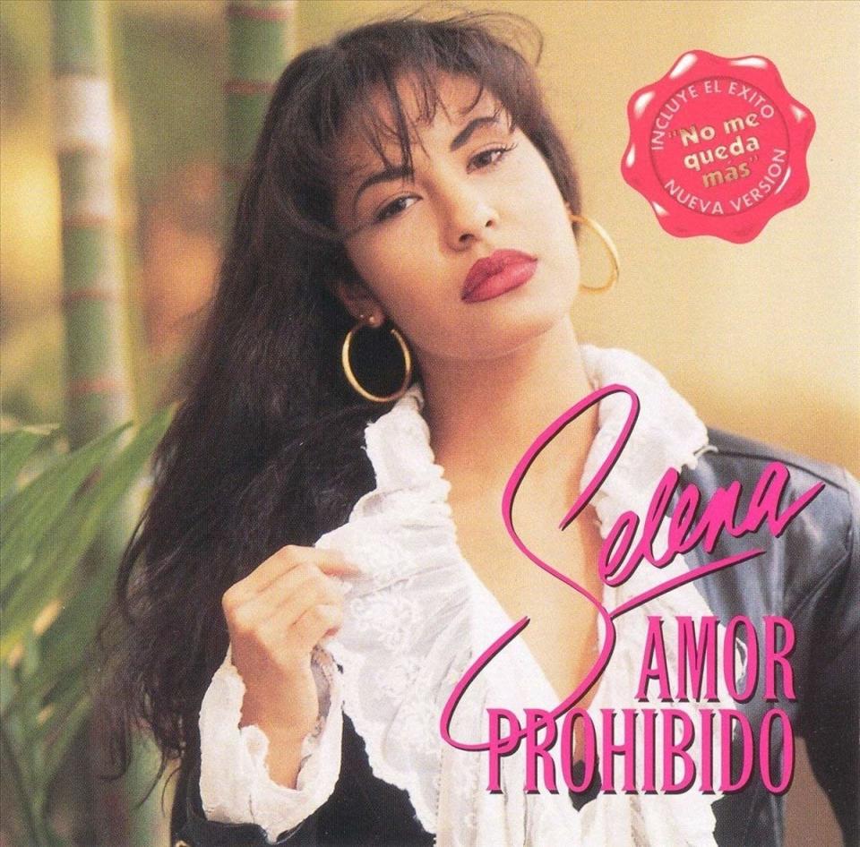 The classic cover of Selena's Amor Prohbido album which features her titling her head to the side, while wearing hoop earnings, a ruffled collar blouse, and black leather jacket