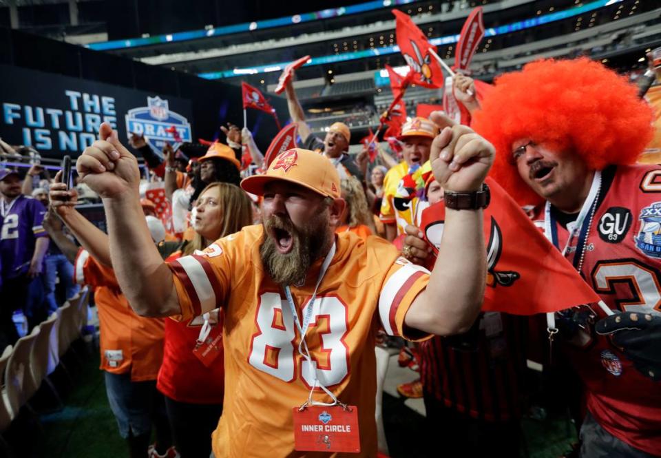 Tampa Bay Buccaneers fans cheer during the second round of the NFL draft in April in Arlington, Texas. On Friday, Bucs executives promised an exciting season for fans at the inaugural “Beyond the End Zone” luncheon, hosted by the Manatee Chamber of Commerce.