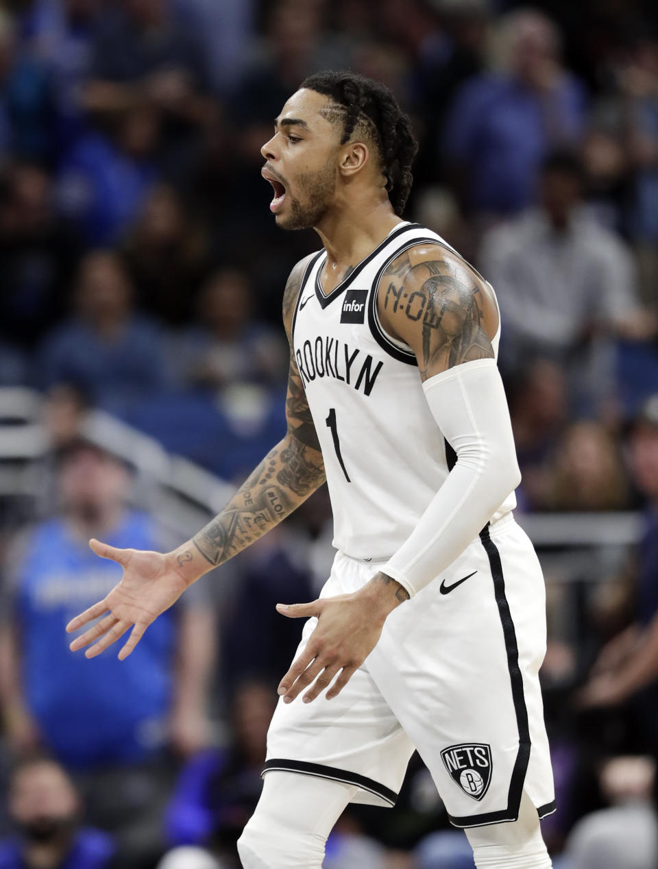 Brooklyn Nets' D'Angelo Russell celebrates after making a 3-point shot during the final moments of the team's NBA basketball game against the Orlando Magic, Friday, Jan. 18, 2019, in Orlando, Fla. (AP Photo/John Raoux)