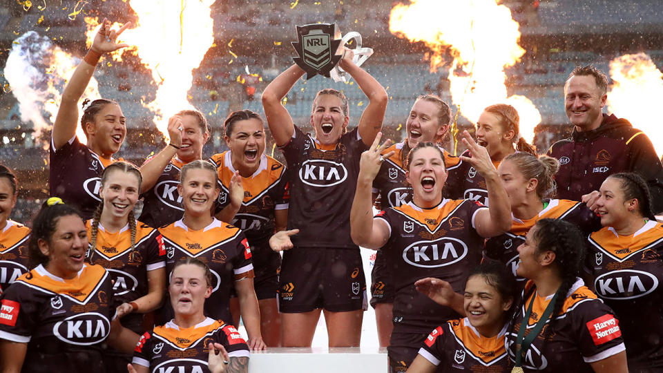 The Brisbane Broncos are pictured celebrating their NRLW premiership victory.