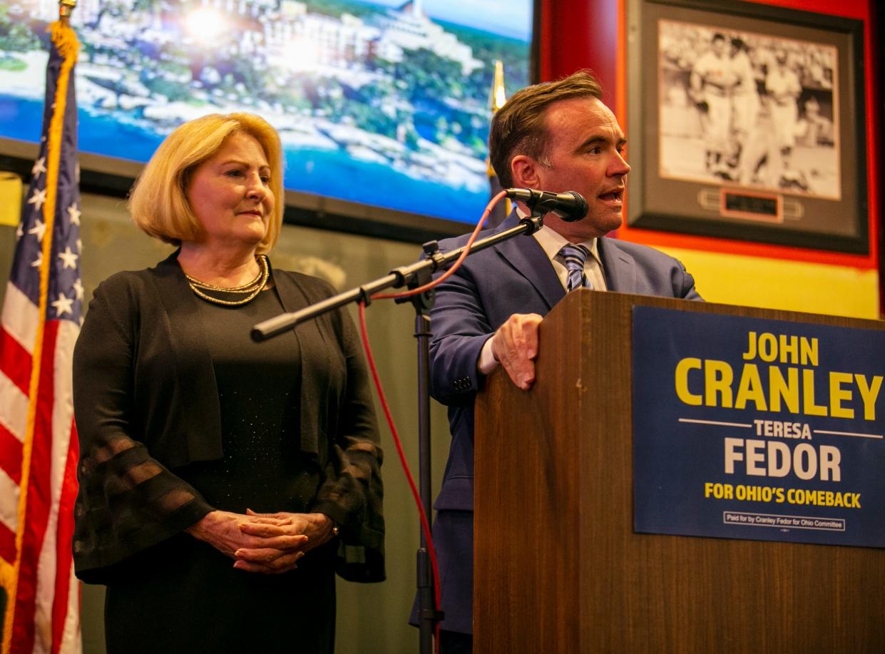 John Cranley, former Cincinnati mayor, addresses his supporters and the media with his running mate, Teresa Fedor, on Tuesday.