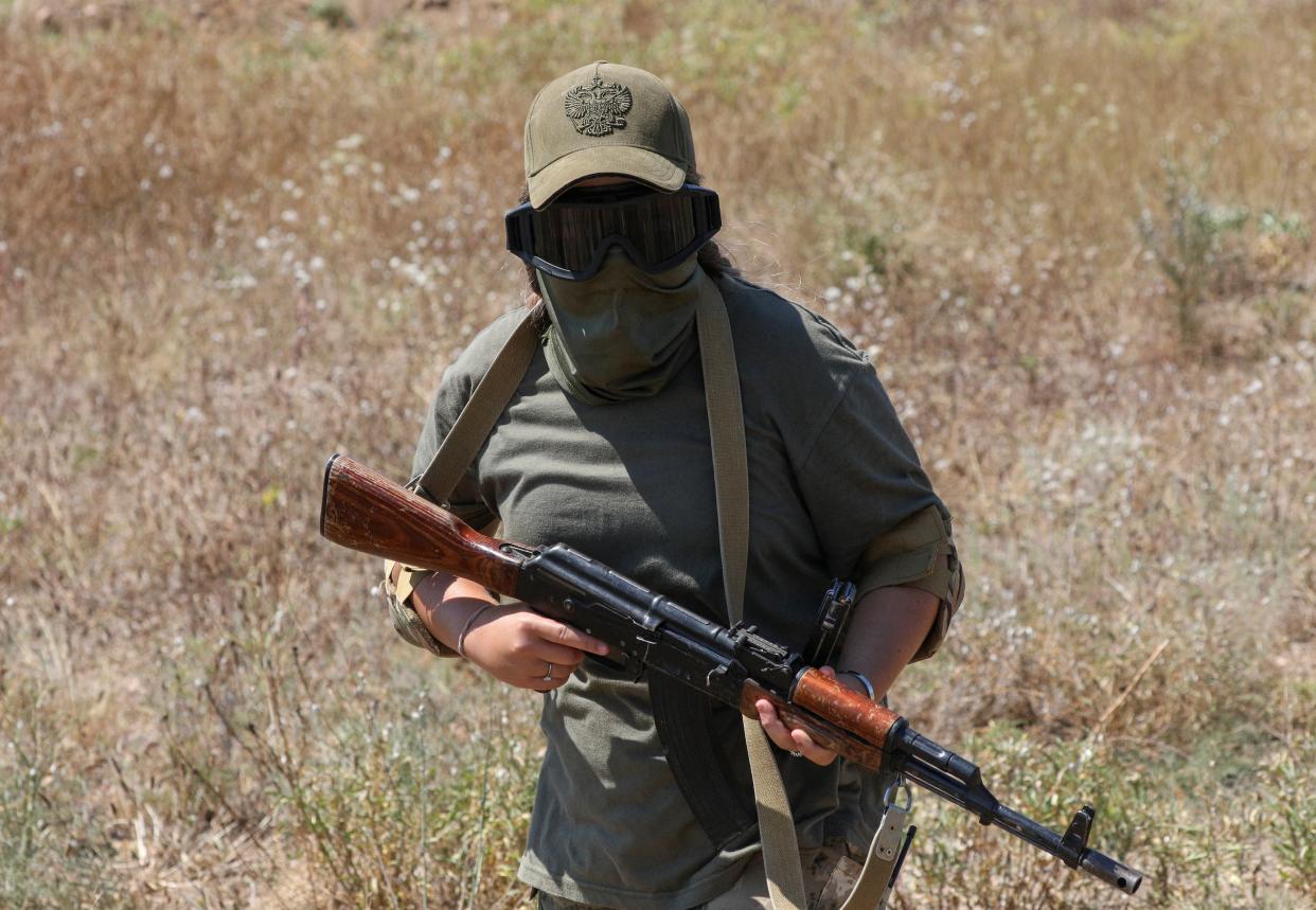 Russian territorial defence female unit holds drills near Yevpatoriya (REUTERS)