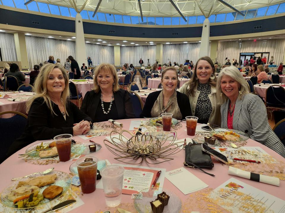 About 275 men and women attended the Laura W. Bush Institute for Women's Health Day of the Woman dinner Tuesday evening in the Amarillo Civic Center Grand Plaza. The featured guest speaker Kevin Hines discussed the importance of mental health.