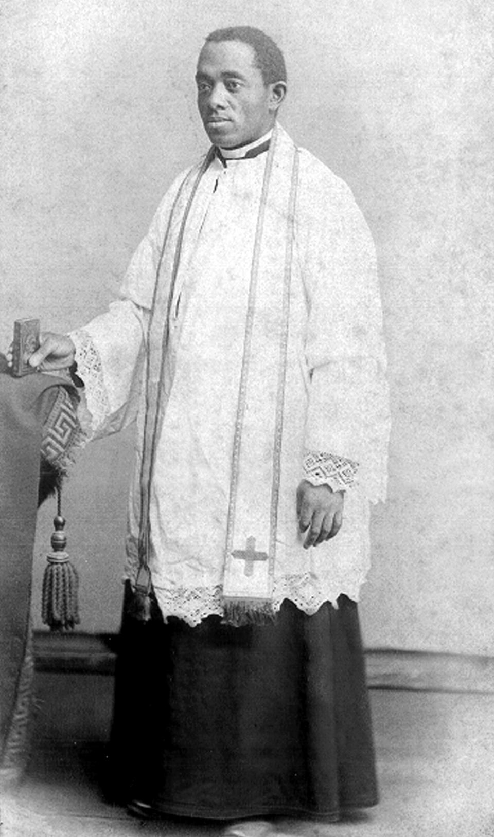 This 1886 photo courtesy of the Brenner Library, Quincy University in Quincy, Ill., shows Quincy's Father Augustine Tolton, following his ordination on Holy Saturday of that year. Pope Francis has positioned for sainthood a former slave and the first known black priest in America. The pontiff on Wednesday, June 12, 2019, declared the Rev. Augustine Tolton of Quincy "venerable." The Diocese of Springfield announced that the designation means that Tolton lived a life of "heroic virtue." Church officials are investigating possible miracles attributed to Tolton which could lead to his canonization.(photo courtesy of Brenner Library, Quincy University via AP)