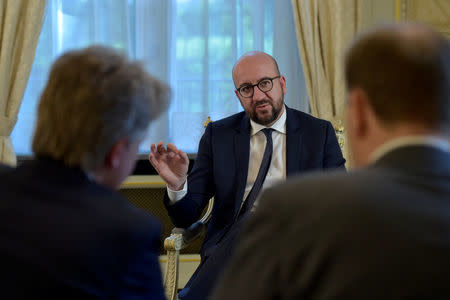 Belgium's Prime Minister Charles Michel (C) speaks during an interview with Reuters at his residence in Brussels, Belgium March 21, 2017. Reuters/Eric Vidal