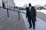 Defense Secretary Lloyd Austin arrives at the Pentagon, Friday, Jan. 22, 2021, in Washington. (AP Photo/Alex Brandon)