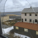 In this April 2015 photo, the buildings of the former Adak Naval Air Facility sit vacant in Alaska. The Trump administration is considering using West Coast military bases or other federal properties as transit points for shipments of U.S. coal and natural gas to Asia. (Julia O'Malley/Alaska Daily News via AP)