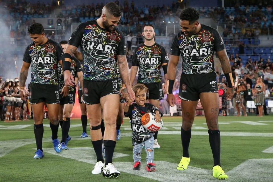 Quaden Bayles and members of the National Rugby League’s Indigenous All Stars team | Jason McCawley/Getty Images