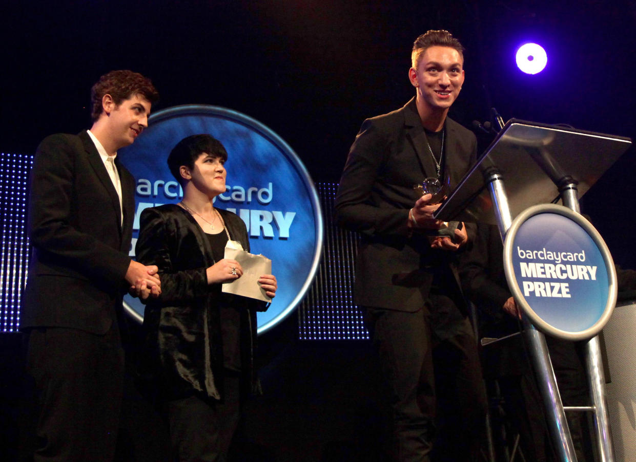 (From left to right) Jamie Smith, Romy Madley Croft and Oliver Sim of The XX are announced as the winner of the Mercury Prize, at the Grosvenor House hotel in central London.   (Photo by Yui Mok/PA Images via Getty Images)