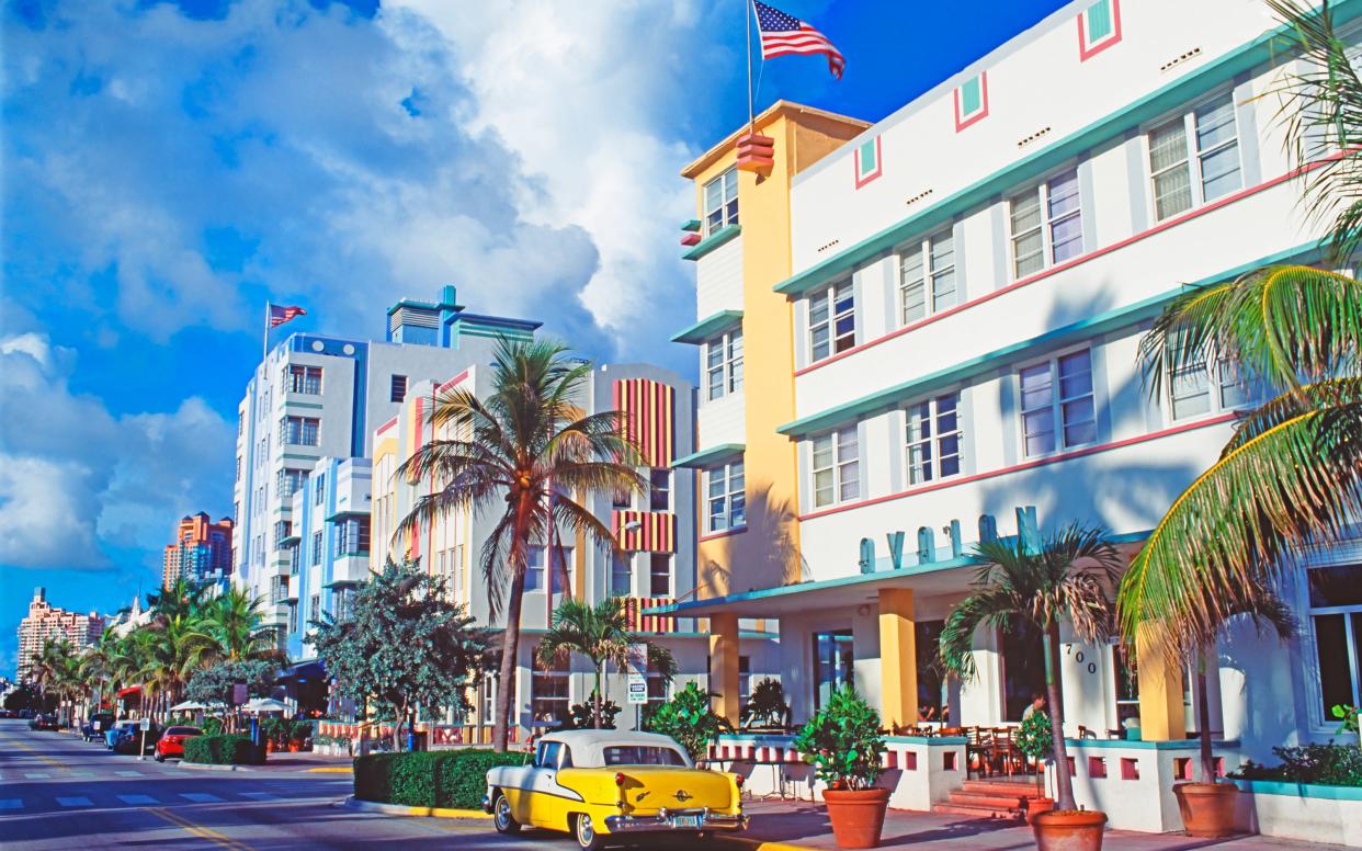 The Art Deco buildings in Miami's South Beach give a stroll around the neighbourhood a vintage feel - Mitchell Funk