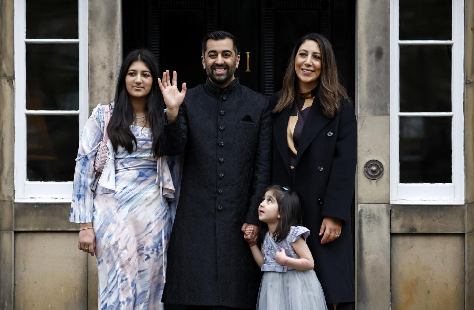 Humza Yousaf, poses alongside his wife, Nadia El-Nakla (R), step daughter, Maya (L) and daughter, Amal (2nd R) in March 2023 after being elected Scottish first minister. (Getty)