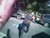 <p>Charlotte police officers point their guns at a fallen Keith Scott after shooting him four times in Charlotte, North Carolina, U.S. in this September 20, 2016 still image from video released by Charlotte police. Investigation of shooting death of Keith Lamont Scott at hands of Charlotte police</p>