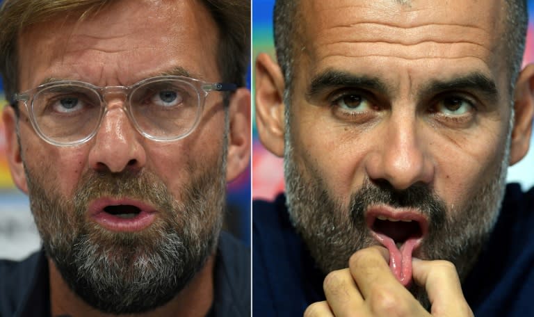 Liverpool boss Jurgen Klopp (left) is going head to head with Manchester City manager Pep Guardiola for the Premier League title (AFP/Paul ELLIS)