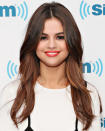 <p>For round face shapes, Marjan, a pro who works regularly with celebrities like Olivia Culpo and Khloe Kardashian, recommends lots of layers that begin at the collarbone. This will elongate the face and amp up the volume. "This can best be seen on Selena Gomez," she says. "I suggest prepping hair with the TRESemmé Beauty-Full Volume Pre-Wash Conditioner ($5; <a rel="nofollow noopener" href="https://www.target.com/p/tresemm-233-beauty-full-volume-pre-wash-conditioner-16-5oz/-/A-46773781?" target="_blank" data-ylk="slk:target.com;elm:context_link;itc:0;sec:content-canvas" class="link ">target.com</a>) and Shampoo and using the Touchable Bounce Mousse ($5; <a rel="nofollow noopener" href="https://www.target.com/p/tresemm-233-beauty-full-volume-touchable-bounce-mousse-6-77oz/-/A-46773780" target="_blank" data-ylk="slk:target.com;elm:context_link;itc:0;sec:content-canvas" class="link ">target.com</a>) to enhance fullness and movement in the hair without drying it out."</p>