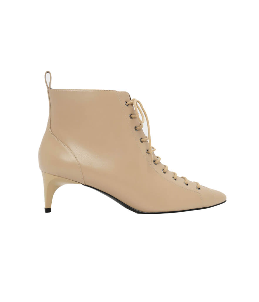 <p>Charles & Keith is a brand best known for its affordable handbags, but don’t overlook its shoe selection. These pretty lace-up kitten heels are right on trend.<br><a rel="nofollow noopener" href="https://fave.co/2qvodSp" target="_blank" data-ylk="slk:Shop it:" class="link rapid-noclick-resp">Shop it:</a> Kitten Heel Lace Up Boots, $69, <a rel="nofollow noopener" href="https://fave.co/2qvodSp" target="_blank" data-ylk="slk:charleskeith.com" class="link rapid-noclick-resp">charleskeith.com</a> </p>