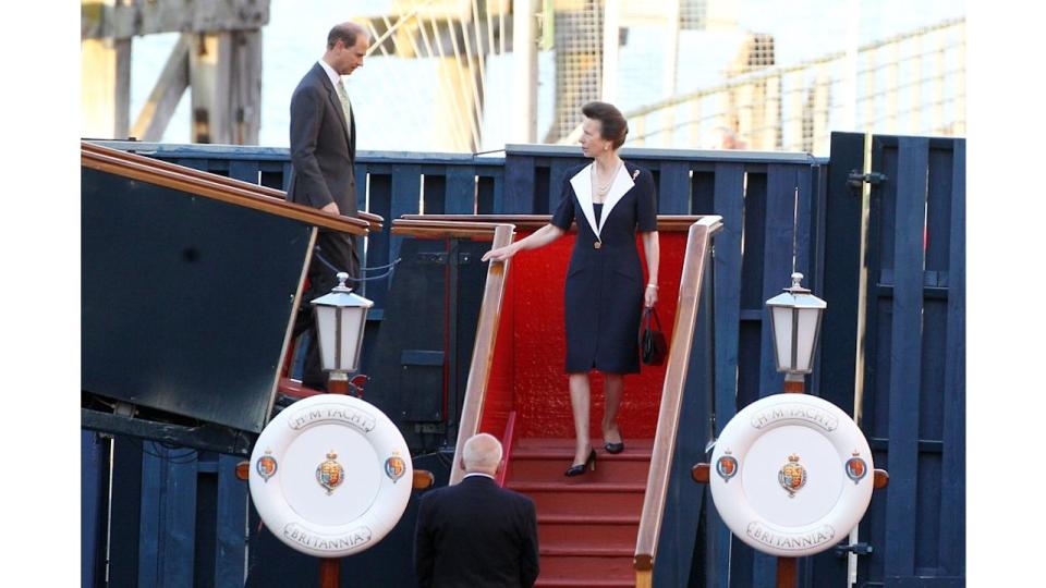 Princess Anne walking down steps of the Royal Yacht Britannia