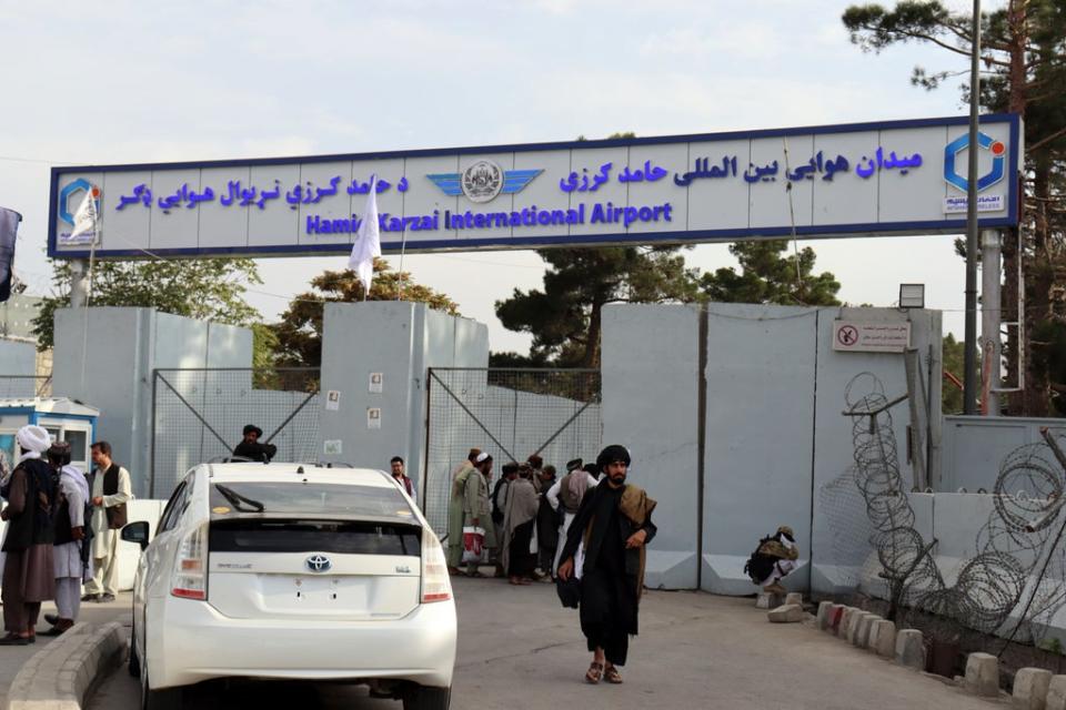 Taliban fighters stand guard in front of the Hamid Karzai International Airport after the U.S. withdrawal in Kabul, Afghanistan, Tuesday, Aug. 31, 2021. The Taliban were in full control of Kabul’s international airport on Tuesday, after the last U.S. plane left its runway, marking the end of America’s longest war (AP Photo/Khwaja Tawfiq Sediqi)