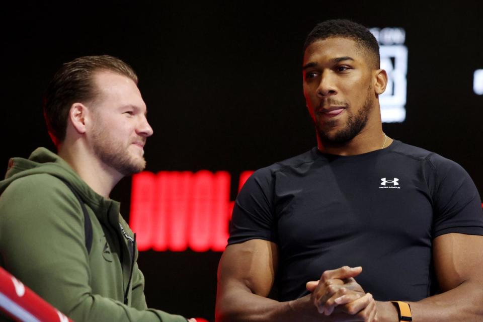 Anthony Joshua (right) with coach Ben Davison ahead of their win over Otto Wallin (Getty Images)