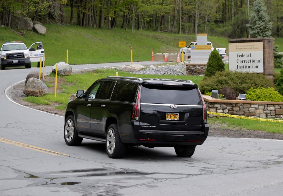 A car carrying Michael Cohen arrives at a federal prison