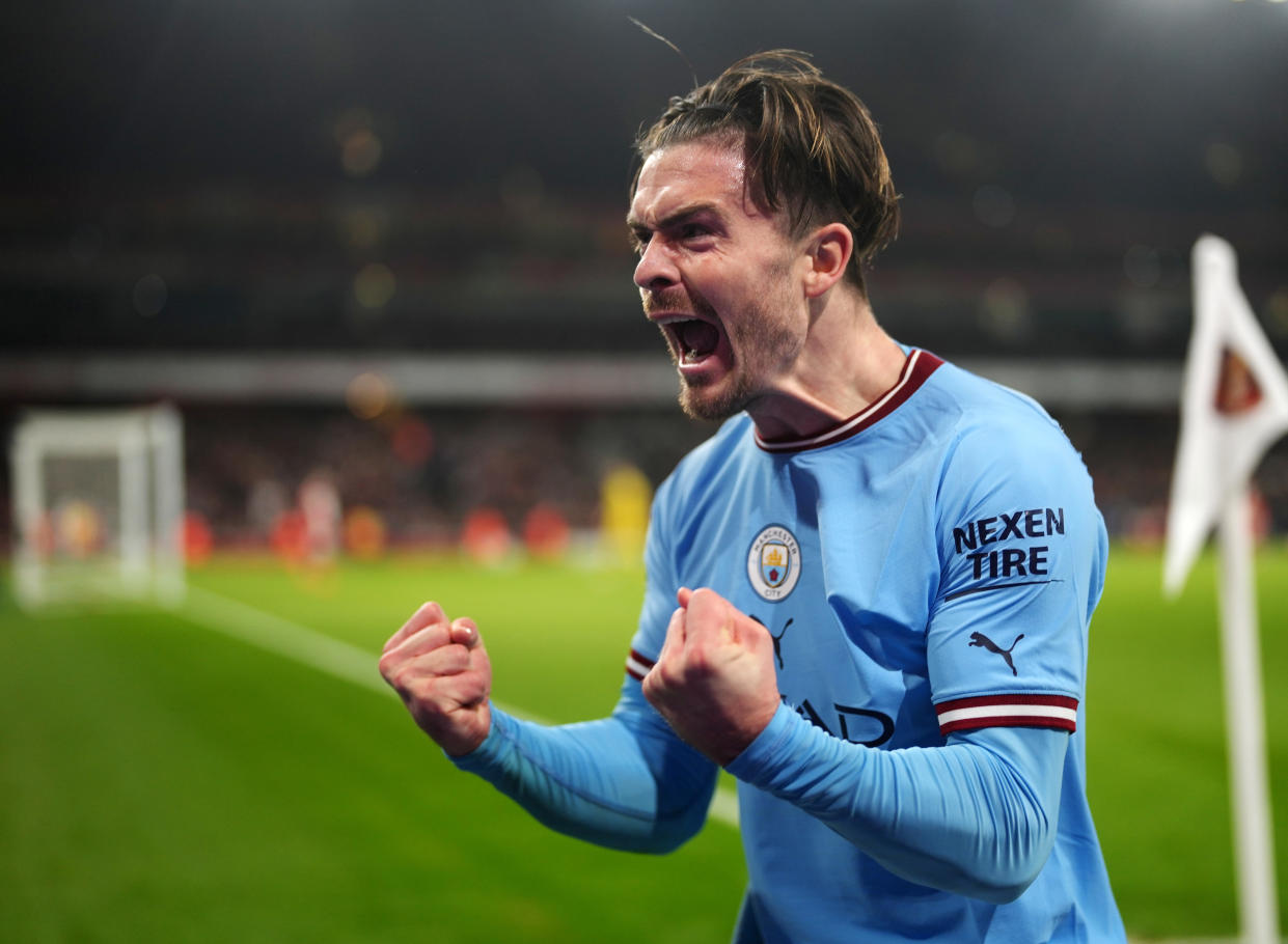 LONDON, ENGLAND - FEBRUARY 15: Jack Grealish of Manchester City celebrates after scoring the team's second goal during the Premier League match between Arsenal FC and Manchester City at Emirates Stadium on February 15, 2023 in London, England. (Photo by Tom Flathers/Manchester City FC via Getty Images)