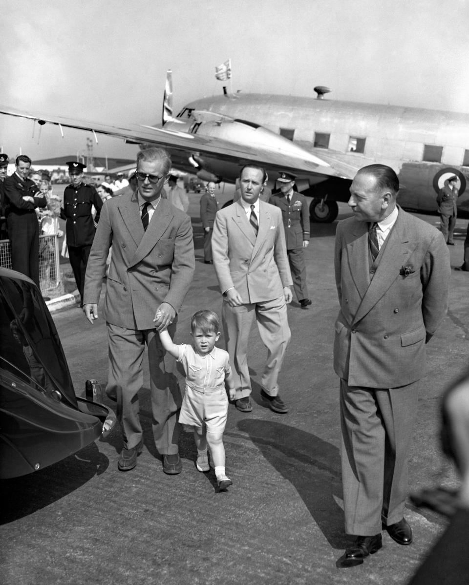 File photo dated 21/07/51 of Prince Charles leading his father by the hand from the Viking Aircraft of the King's Flight in which the Duke of Edinburgh arrived home from Malta. The royal family has paid tribute to the Duke of Edinburgh on the day he would have turned 100. Issue date: Thursday June 10, 2021.