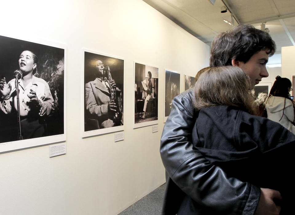 Visitors look around the Jazz exhibition during international Jazz Day at the UNESCO headquarters in Paris, Friday, April 27, 2012. (AP Photo/Jacques Brinon)