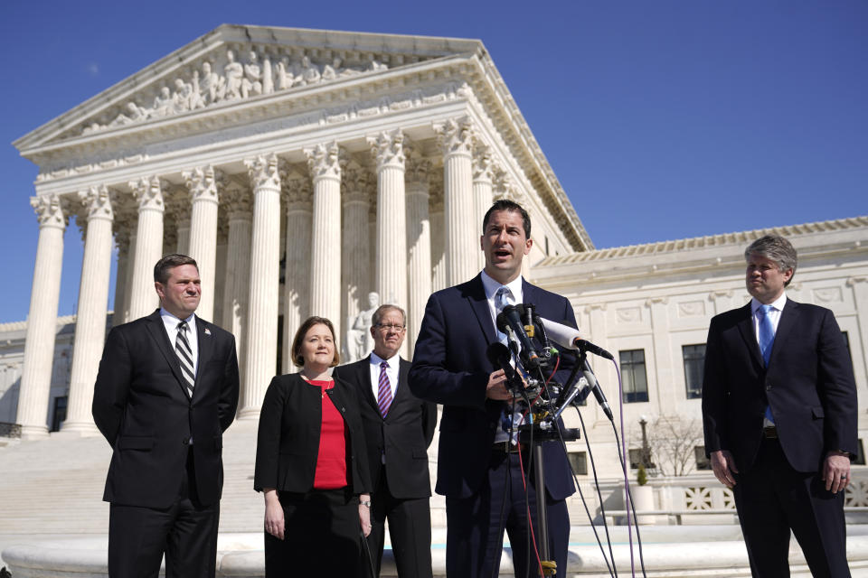 Nebraska Solicitor General Jim Campbell speaks with reporters outside the Supreme Court on Capitol Hill in Washington, Tuesday, Feb. 28, 2023, after arguing before the court against President Joe Biden's student debt relief plan. Standing behind Campbell are Missouri Attorney General Andrew Bailey, from left, Iowa Attorney General Brenna Bird, Ray Wagner of the Missouri Attorney General's office and Nebraska Attorney General Mike Hilgers. (AP Photo/Patrick Semansky)