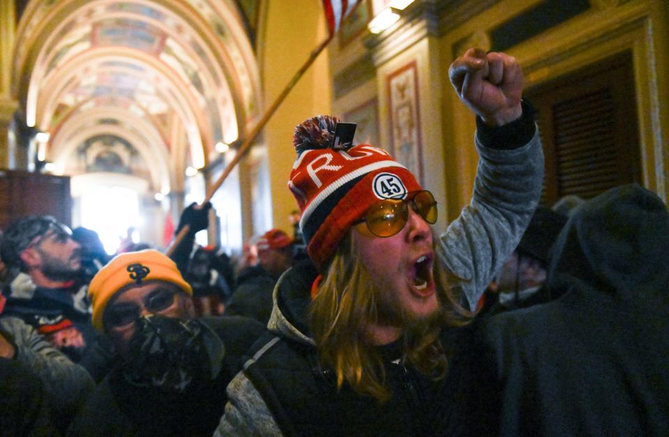 Supporters of US President Donald Trump protest inside the US Capitol on January 6, 2021, in Washington, DC. - Demonstrators breeched security and entered the Capitol as Congress debated the a 2020 presidential election Electoral Vote Certification. (Photo by ROBERTO SCHMIDT / AFP) (Photo by ROBERTO SCHMIDT/AFP via Getty Images)