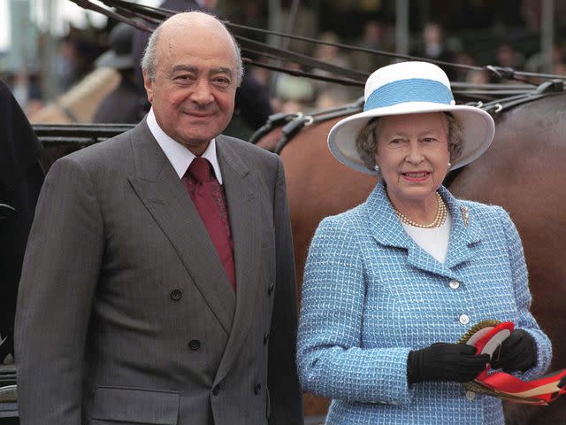 <p>Tim Graham Photo Library/Getty</p> Queen Elizabeth and Mohammed Al Fayed at the Royal Windsor Horse Show.