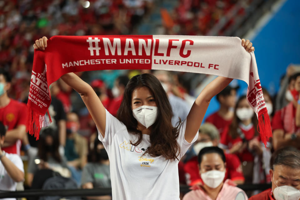 Manchester United's Charlie Savage and Liverpool's Mohamed Salah battling for possession during the pre-season friendly match in Bangkok.