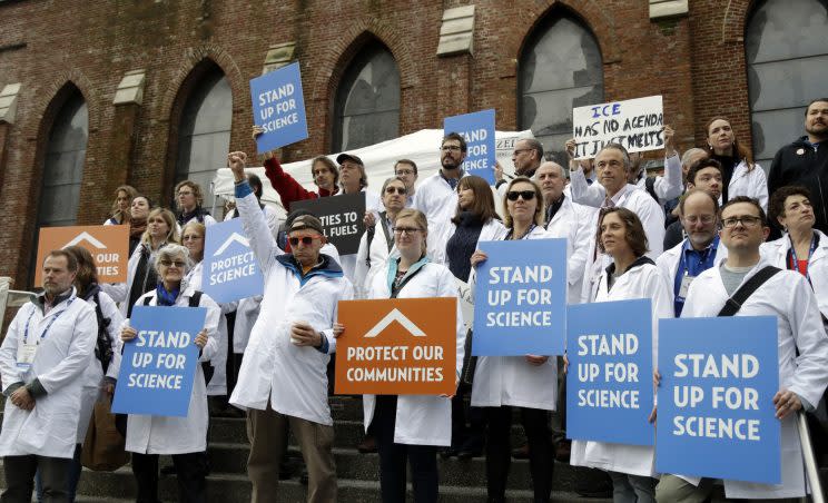 Scientists hold signs during a rally in conjunction with the American Geophysical Union's fall meeting Tuesday, Dec. 13, 2016, in San Francisco. (Photo: Marcio Jose Sanchez/AP)