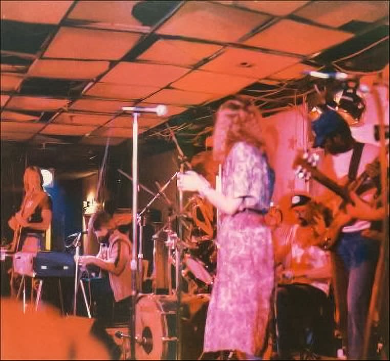 Pam Marsh is shown performing on stage with The Doobie Brothers when they put on a spontaneous set at The Misty Moon nightclub in August 1980. The band was in town for a show at the Metro Centre. (Submitted by Pam Marsh - image credit)