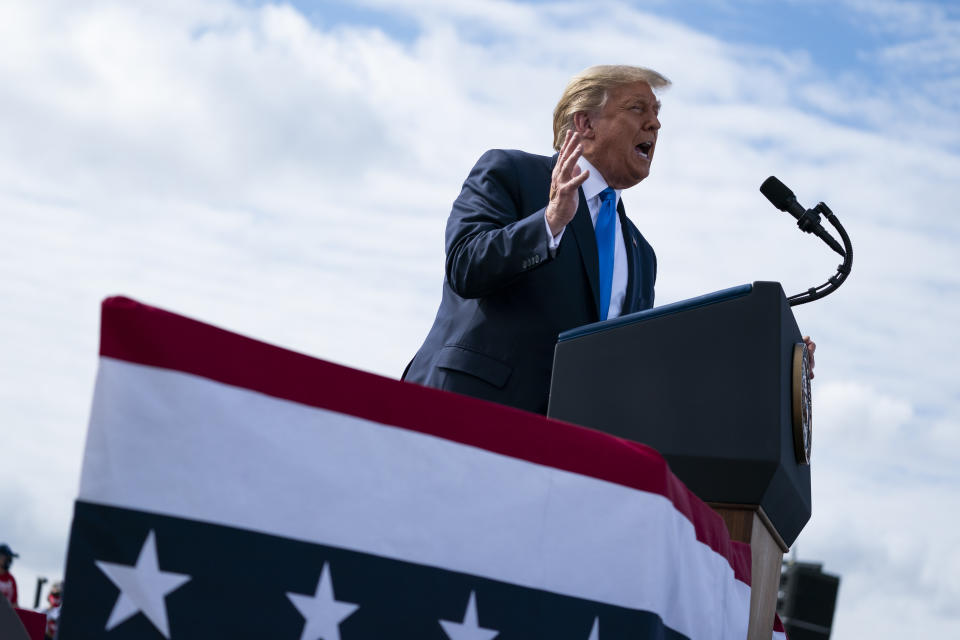 President Donald Trump speaks during a campaign rally at Pitt-Greenville Airport, Thursday, Oct. 15, 2020, in Greenville, N.C. (AP Photo/Evan Vucci)